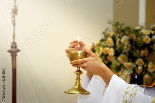 Obraz na plátně Consecration of bread and wafer wine