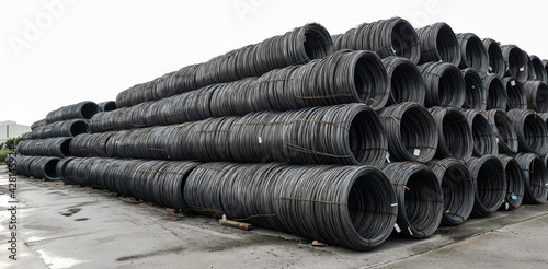 Stacked of high carbon wire rod for heavy industry production,Pile of metal steel wire roll for construction site, concrete usage and building construction