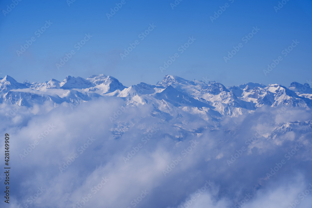 View over Swiss alps from Mount Rigi, Switzerland. Photo taken April 14th, 2021, Rigi Kulm, Switzerland. View over Swiss alps from Mount Rigi, Switzerland. Photo taken April 14th, 2021, Rigi Kulm, Switzerland.