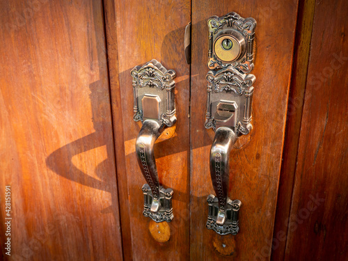 View to brown wooden enterance vintage door photo