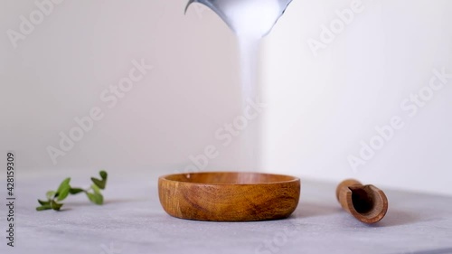 Video the natural sweetener is poured into a wooden bowl. Erythritol photo