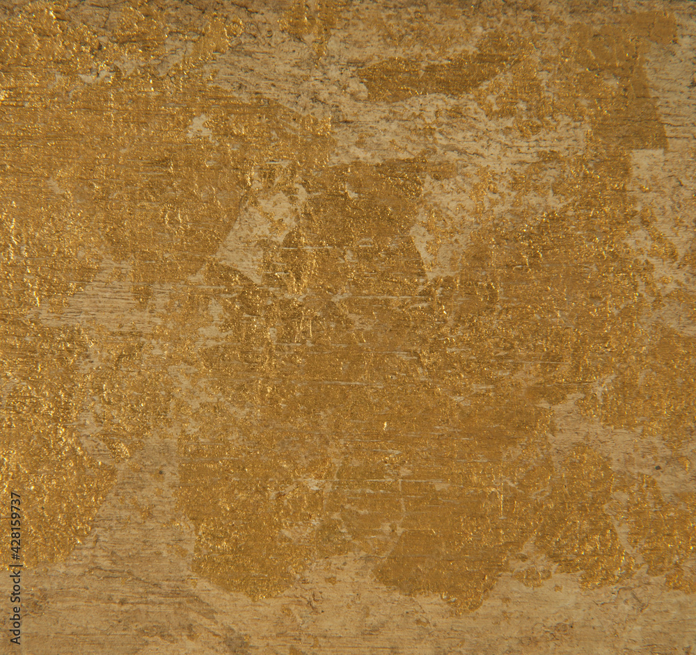 Metallic golden foil texture. Antique gold foil square background.
