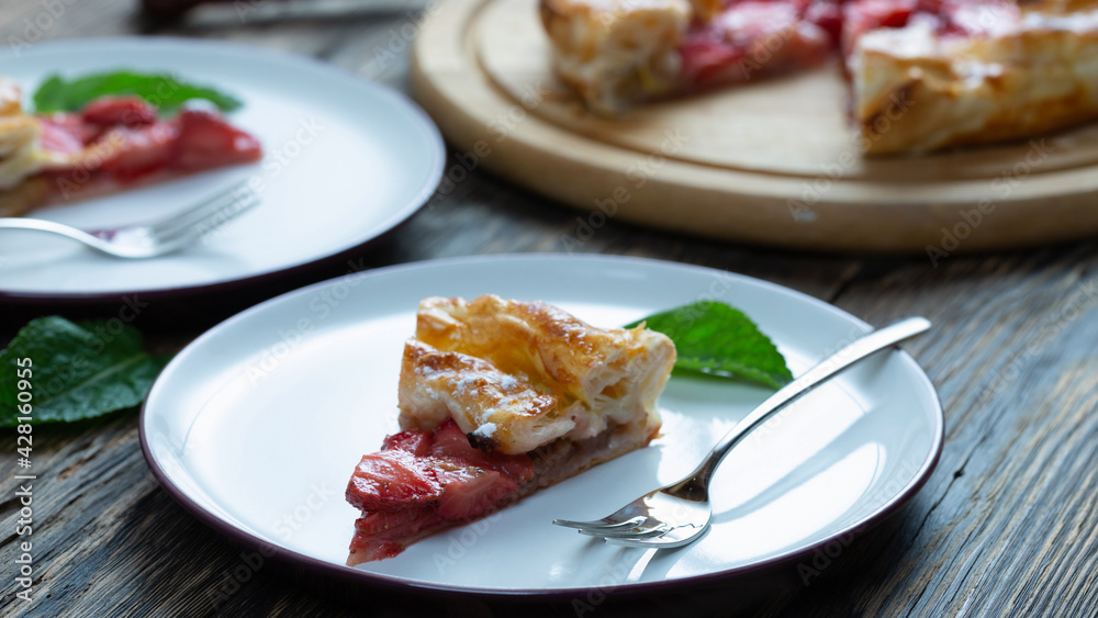 tart with strawberries on a wooden table. Copy space, top view. tart with strawberries on a wooden table. Copy space, top view.