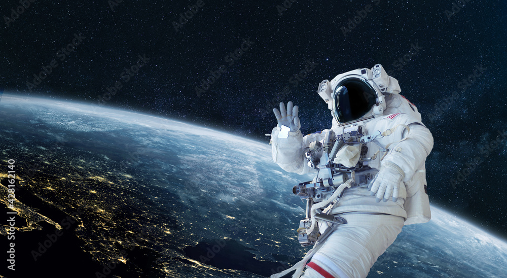 Space man astronaut greets and waves his hand in space on a background of  the blue planet Earth. Space mission wallpaper, concept. Welcome to space  Stock Photo | Adobe Stock