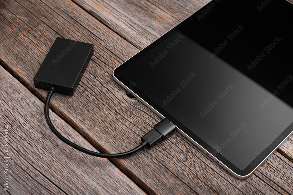 Memory card or external hard drive is connected to the Tablet PC.