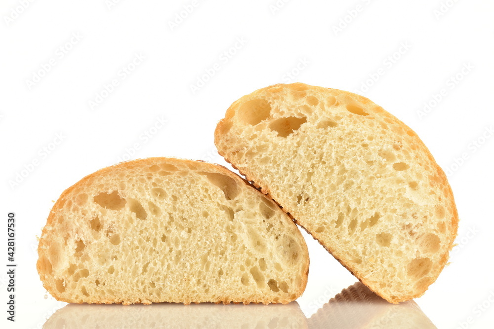 Two halves of fresh aromatic ciabatta, close-up, isolated on white.