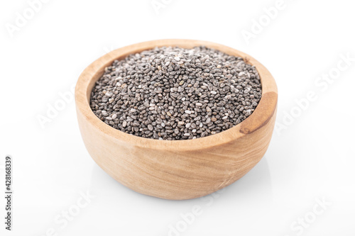 Chia seeds. Chia seeds in wooden bowl on white background. chia