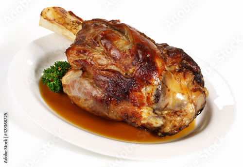 Roasted Veal Shank with Sauce - Isolated on white Background