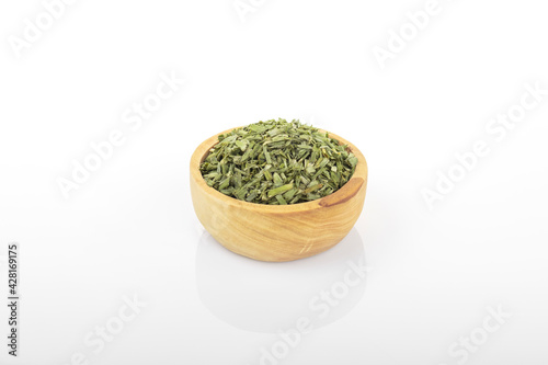 dry chopped spring onion  in wooden bowl on white background. dry chopped or scallion. dry green onion, chopped onion, chopped spring onion.