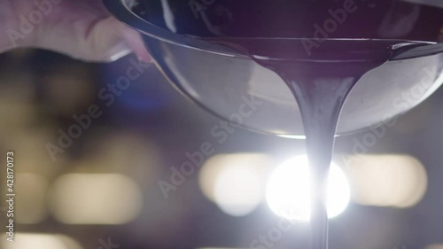 Melted Chocolate Pouring into Shapes