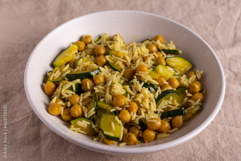 Basmati rice with zucchini, chickpeas and curry. Basmati rice with zucchini, chickpeas and curry.