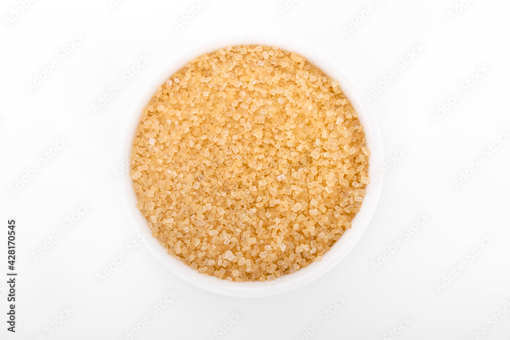brown sugar. Granulated brown sugar in white bowl on white background. brown sugar. Granulated brown sugar in white bowl on white background.