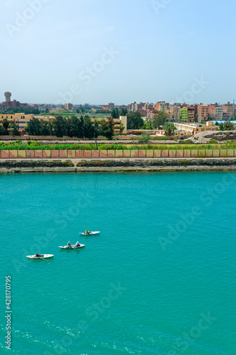 Suez Canal, fishing boat In Al Qantara, Egypt photo