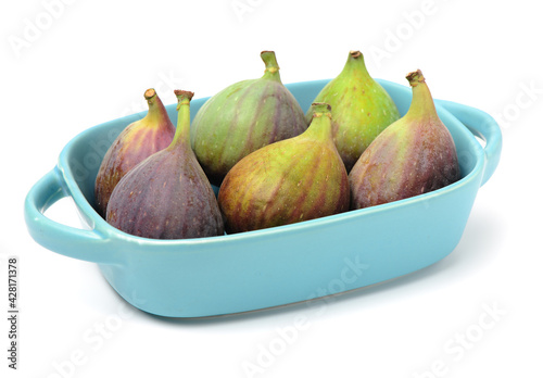 Ripe figs on a white background