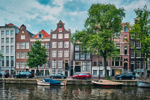 Singel canal in Amsterdam with houses. Amsterdam, Netherlands © Dmitry Rukhlenko