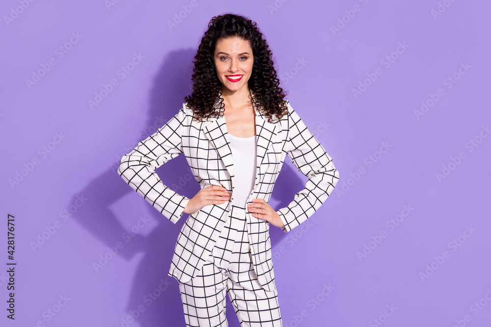 Photo portrait of pretty businesswoman confident smiling wearing checkered white suit isolated on bright purple color background Photo portrait of pretty businesswoman confident smiling wearing checkered white suit isolated on bright purple color background