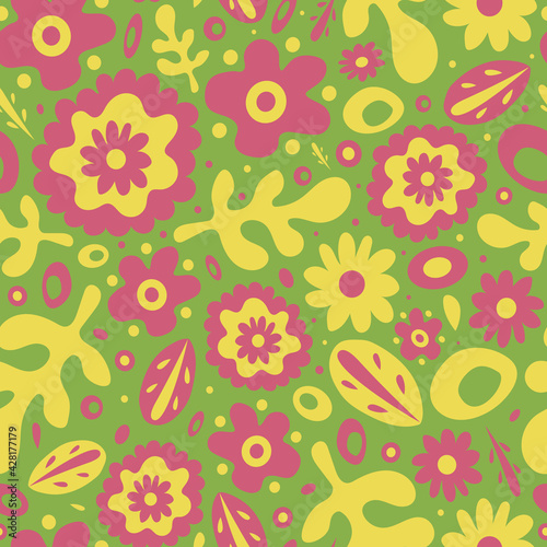 Cute and colorful 60s style pattern with graphic flowers, leaves and dots on green background. Funky and bright floral print, retro style