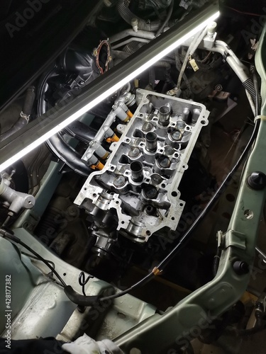 Visual inspection inside of a car engine using flourensense light