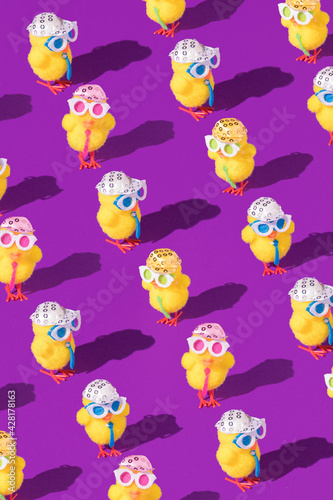 Fototapeta Naklejka Na Ścianę i Meble -  Minimal Easter pattern background with party chicken with hat, tie and glasses. Creative party or holiday concept.
