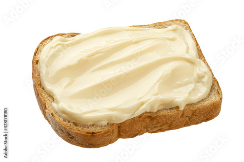 Fotografi Slice of bread with cream cheese isolated on white background, top view