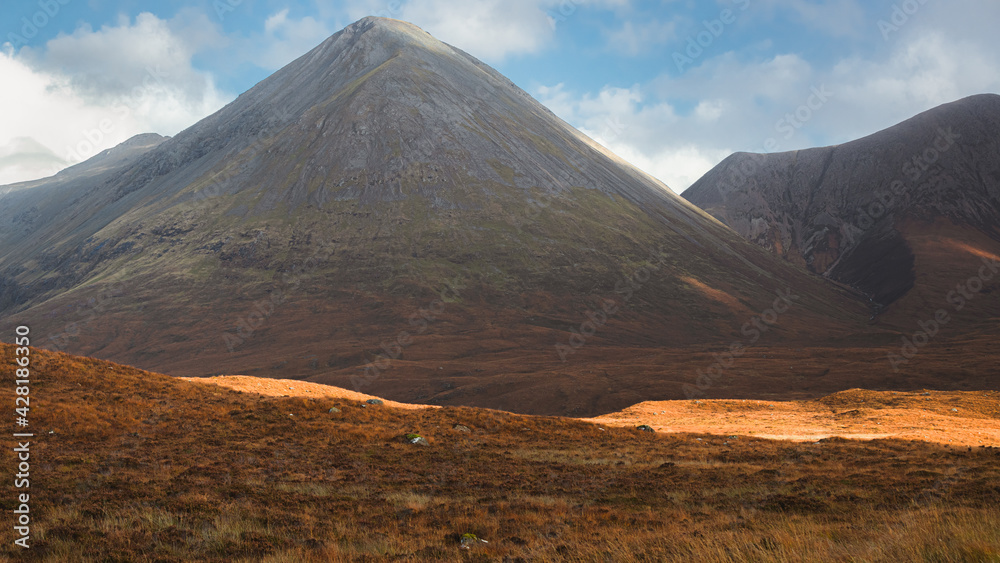 Dramatic light and shadow on the mountain landscape of Glamaig peak in the Red Cuillins hills near Sligachan on the Isle of Skye, Scottish Highlands, Scotland.