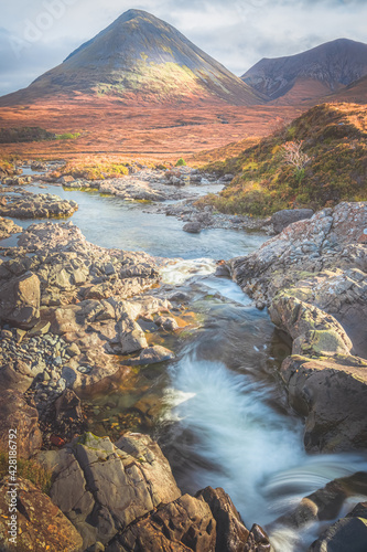 Scenic landscape view of the Glamaig peak in Red Cuillin mountains and Sligachan waterfall on the Isle of Skye, Scottish Highlands, Scotland.
