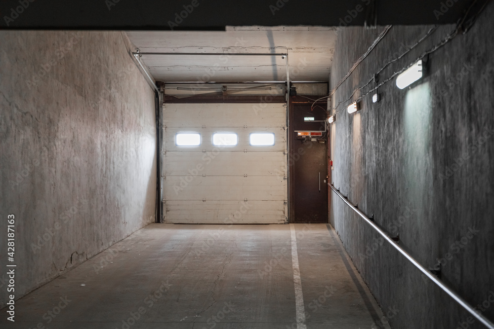 large empty garage space from the inside large empty garage space from the inside