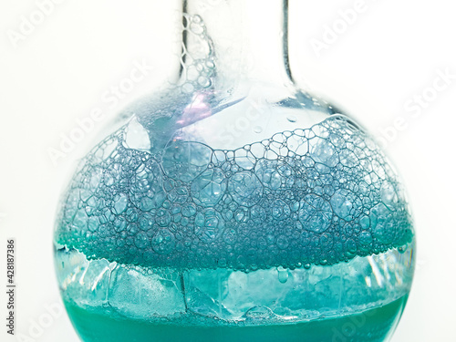 Glass flask with a chemical reagent. photo