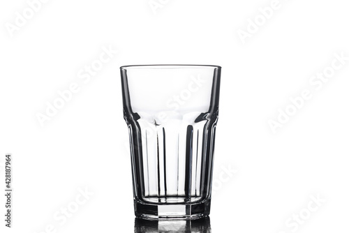 Empty highball glass on a white background. Isolated