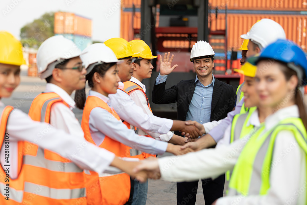 warehouse boss engineer with factory workers raise hand and shaking hands together for congratulations in containers warehouse storage warehouse boss engineer with factory workers raise hand and shaking hands together for congratulations in containers warehouse storage