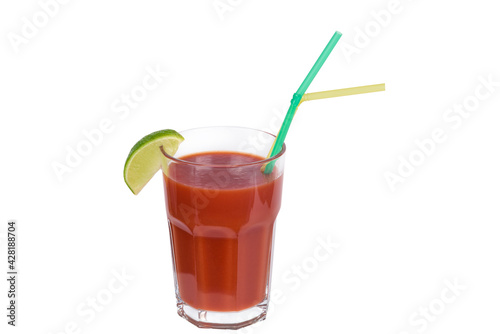 A glass of tomato juice with a slice of lime on a white background.