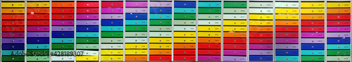 Ultra wide panorama of multicolored mailboxes of a residential apartment building.