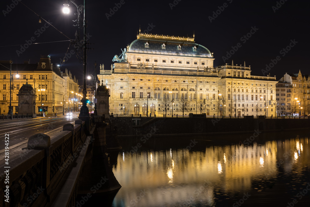 Scenic view of Famous National Theater at night, Prague, Czech Republic in historical center of Prague, buildings and monuments of the  dusk. A beautiful and romantic evening.