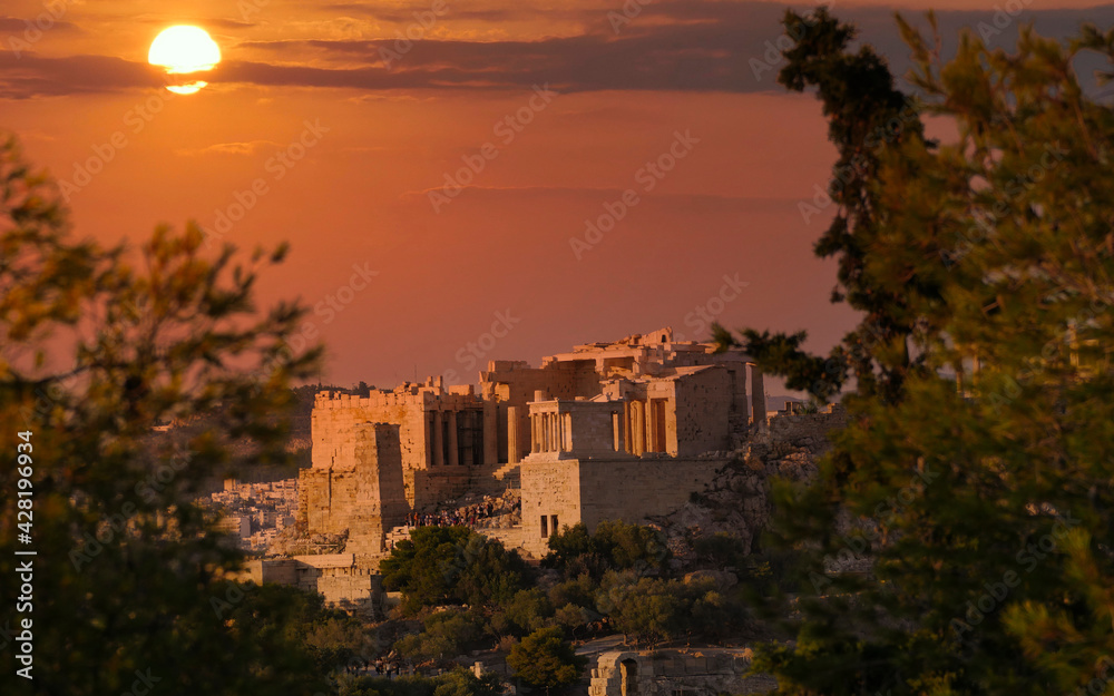 sun and fiery sky over Athens Greece, 