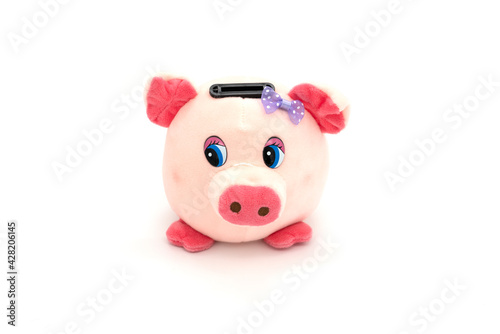 Pink piggy bank isolated on a white background.