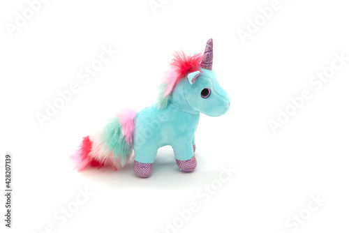 Blue unicorn plush toy. Isolated on white background