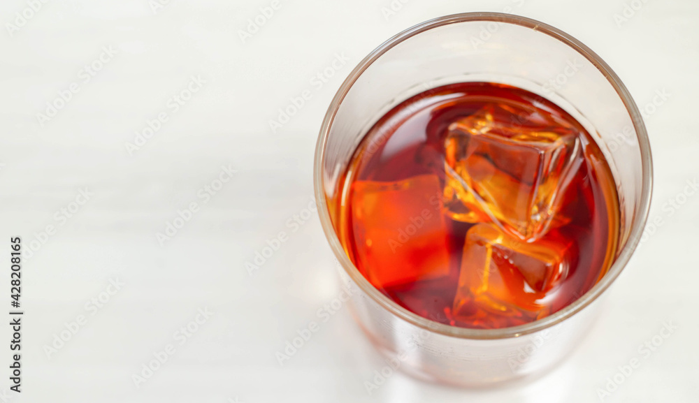 Excellent whisky served with ice cubes in a glass of Old fashioned type