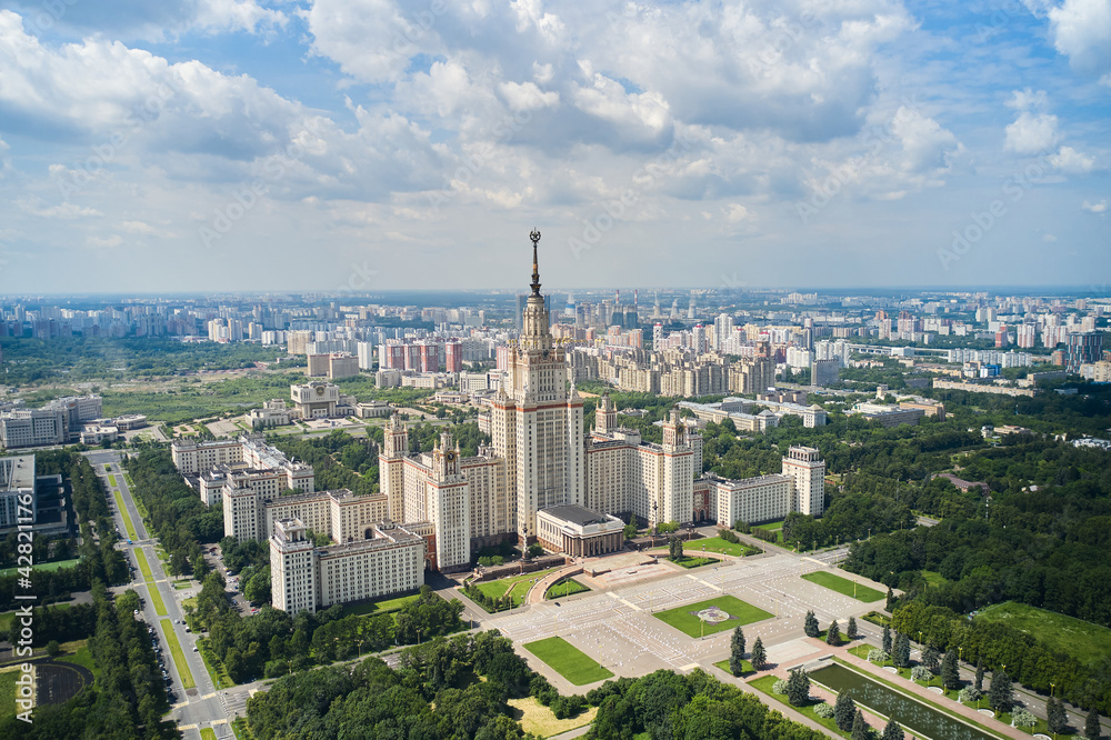 High angle view of Moscow State University. Panoramic view of big city on background and clouds on the sky
