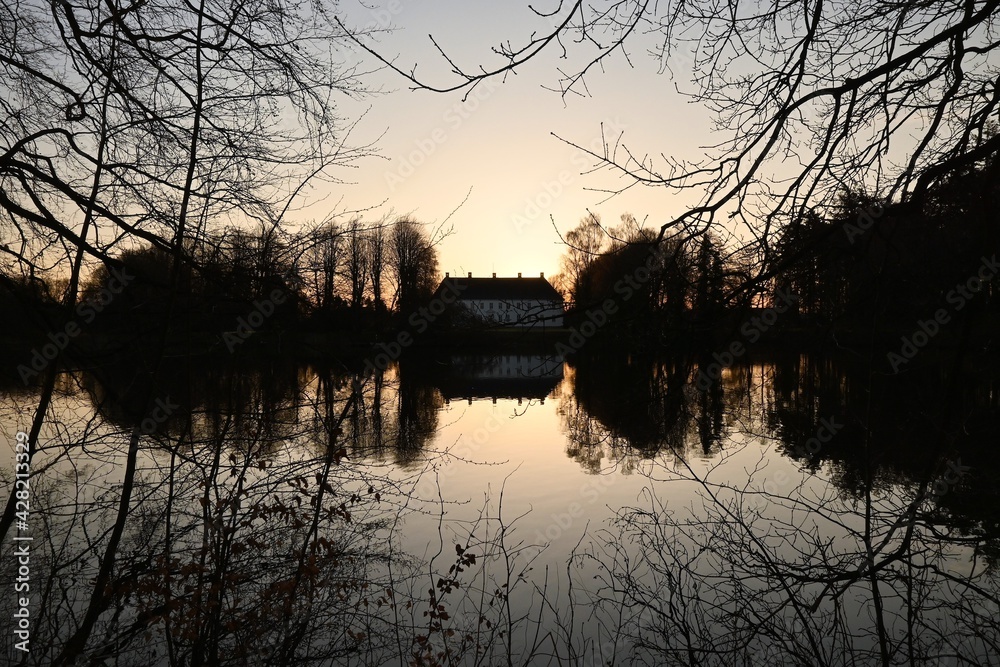 sunrise by the lake and estate