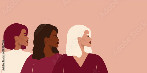 Three women of different nationalities and cultures. Feminist art, women's friendship. The concept of the movement for the empowerment of women of different races.
