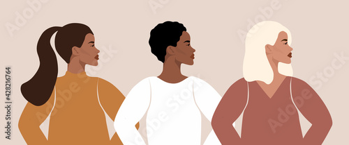 Three women of different nationalities and cultures. Feminist art, women's friendship. The concept of the movement for the empowerment of women of different races.