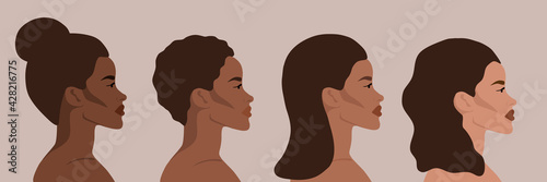Four women of different nationalities and cultures. Multinational beauty. Women's faces of different skin colors.