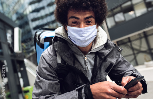 courier, delivery, man, bicycle, fast, food, mask, street, city, smartphonr, take away, worker, service, adult, takeaway, male, speed, transportation, african american, pandemic, people, direction, ou