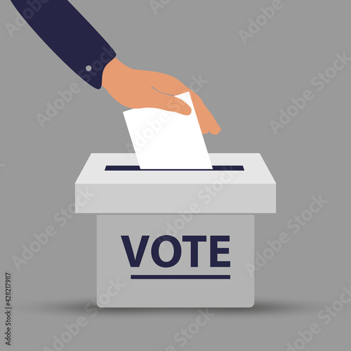  Flat hand putting vote bulletin into ballot box. Election concept