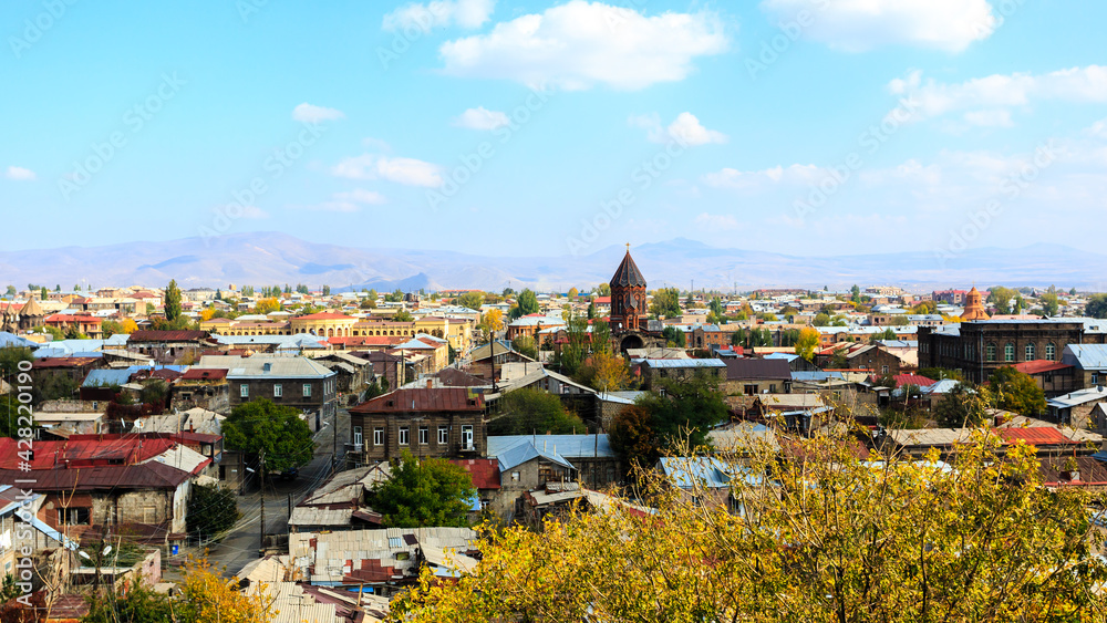 View on Gyumri city, Armenia with the dome of the church against the backdrop of the mountains