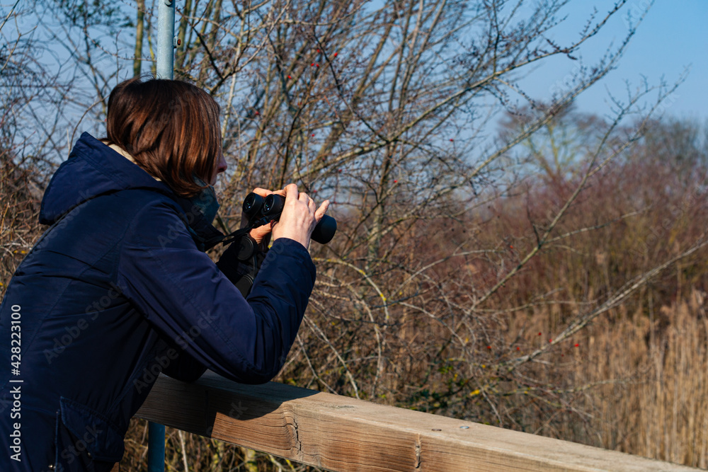 Woman with Binoculars