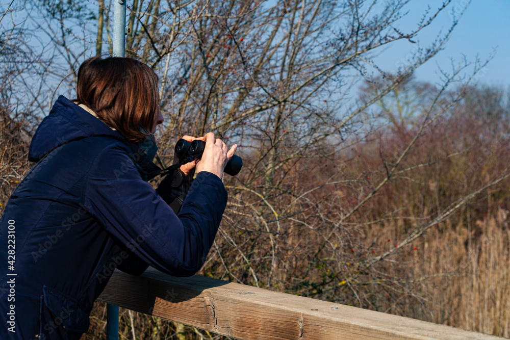 Fototapeta premium Woman with Binoculars