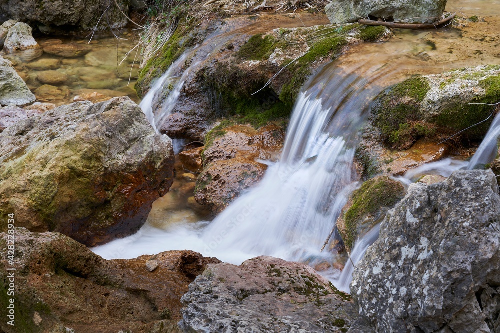 Waterfall at the birth of the Mundo River on Riopar, Albacete, Spain Waterfall at the birth of the Mundo River on Riopar, Albacete, Spain