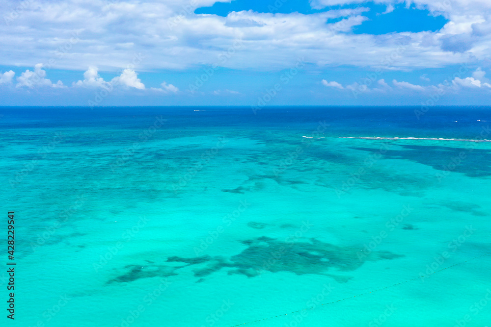 Drone photo of a white sand beach and clear blue water in Cancun, Mexico Drone photo of a white sand beach and clear blue water in Cancun, Mexico