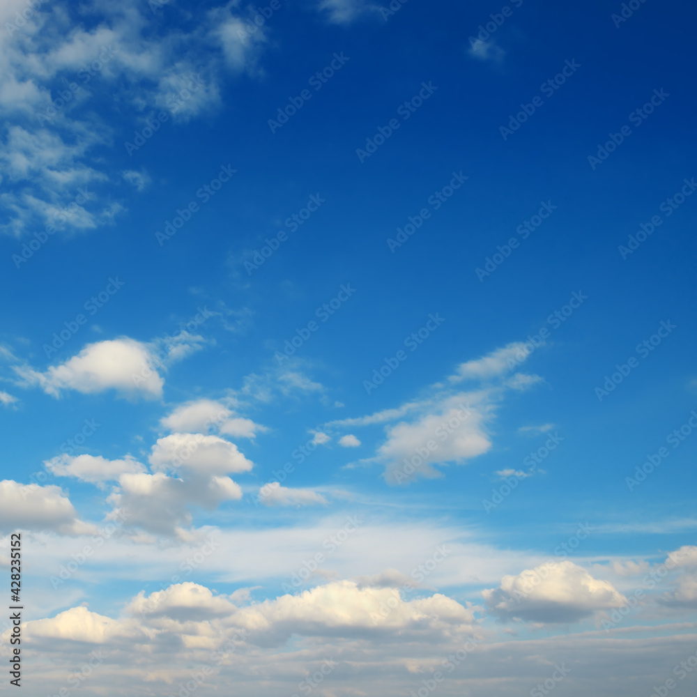 Fluffy clouds against bright azure sky. Fluffy clouds against bright azure sky.